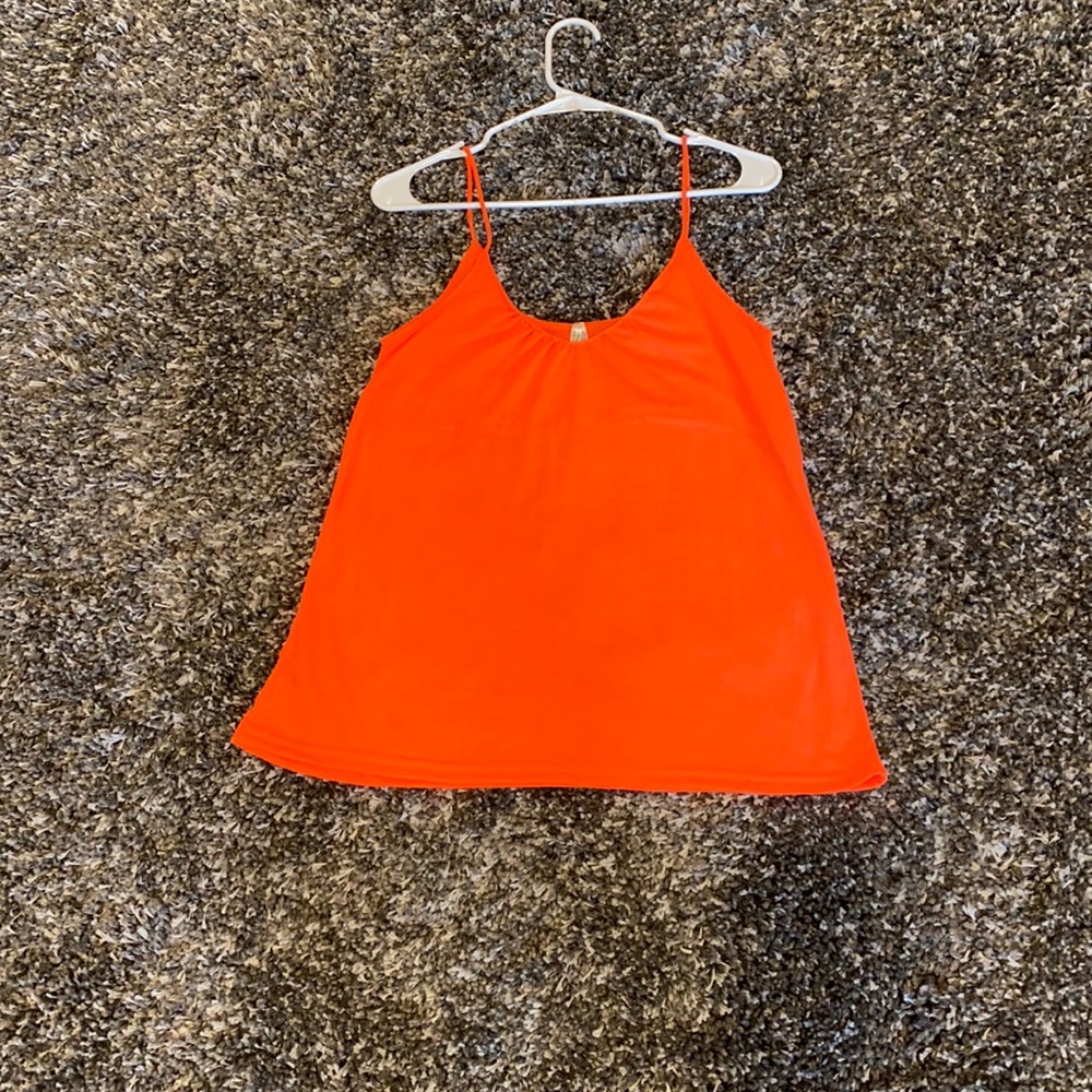 Tank top. New. Never worn. Thin